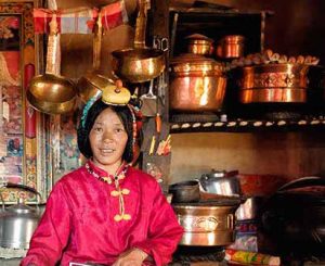 The kitchen and its stove is where TIbetans spend most of their time when at home. It keeps them warm. There their wealth is measured by the amount and quality of the pots they own. Remote Tibetan plateau